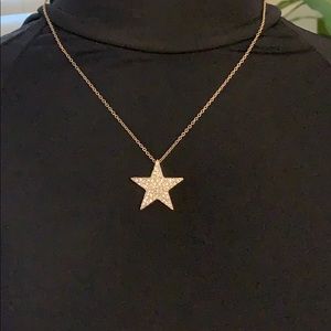 Gold star necklace with diamonds